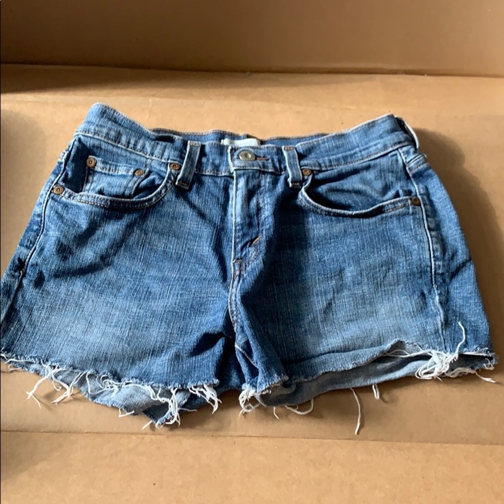 Distressed Levi Jeans.